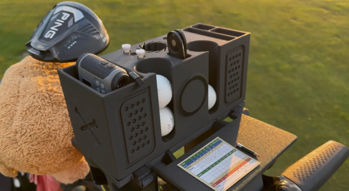 GolfMate Pro on an MGI cart with balls, rangefinder, scorecard and foldable table